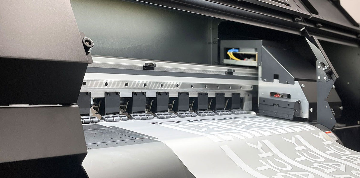 DTF printer running a sheet of transfers